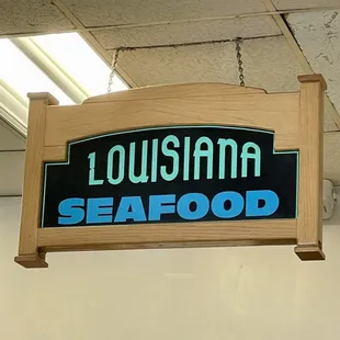 a sign hanging from the ceiling