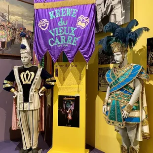 Krewe du Vieux exhibit with parade costumes - New Orleans Mardi Gras REX Exhibition