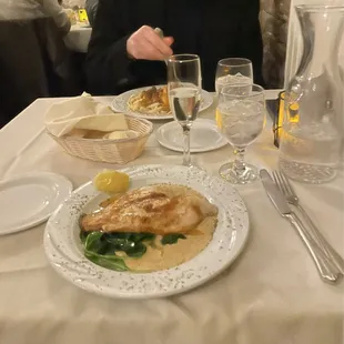 Catfish Louisianne&apos;s on bed of spinach. Tasso and shrimp with pasta.