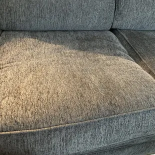 I took the corner cushion out and put it on another part of the sofa and you can see how it has sunk down.