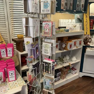 a display of teas and cards