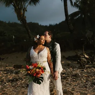Bride and groom at sunset at Loulu Palm