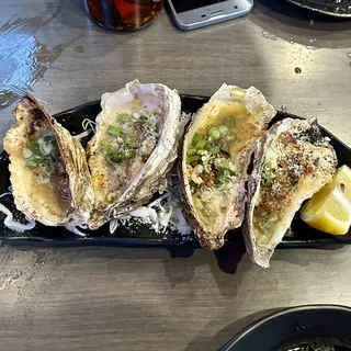 E13. Four Piece BBQ Oyster on a Half Shell