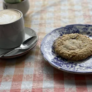 Look at that hazelnut cookie and an almond milk latte.