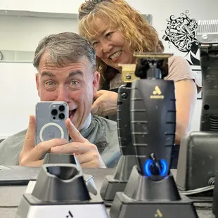 Having fun getting the summer haircut from Nam!