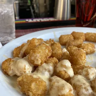 Tots! Not sure what is in the cheese sauce but SO GOOD