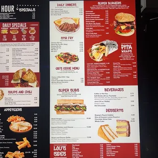 a menu on a brick wall