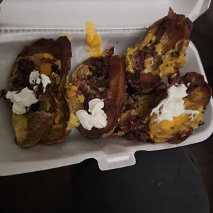 I tried to make it edible by adding sour cream, but who am I kidding? NEVER again, will I order loaded potato skins... Wtf  I'M GOOD!!!