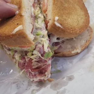 Ruben with lettuce and tomato