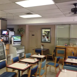 The dining area and the tv.