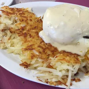 Country Combo special. 2 eggs, patty sausage, biscuit &amp; gravy with hash browns.