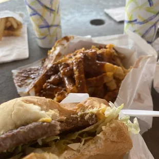 Single cheese burger with chili fries.