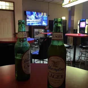 two bottles of lager