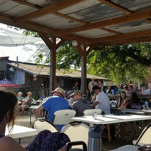 a crowd of people sitting at tables