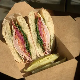 Ham Sandwich  Toasted Ciabatta Bread with Pesto, Spinach, bacon Red Onion, Fresh Tomato, Ham and Swiss