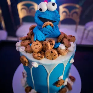 a cookie monster on top of a cake