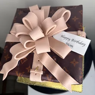 Louis Vuitton vanilla cake with fresh fruit filling and butter cream