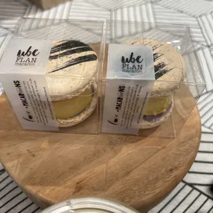 two macarons on a wooden board
