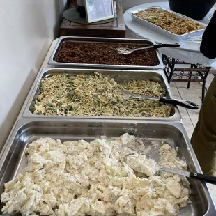 Potato salad, cole slaw and baked beans