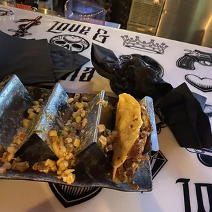 I smashed my shrimp tacos before I could take a picture smh, beef birria taco to the right