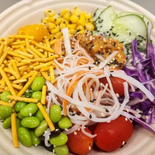 a bowl of vegetables and noodles