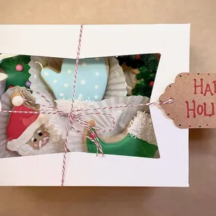 Holiday decorated cookies in a box