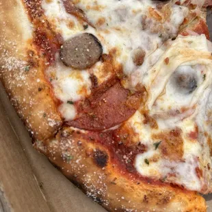 Meat lovers pizza...you only get a photo of my last 3 pieces because I couldn&apos;t stop eating after the first bite