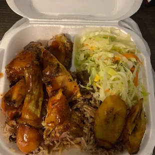 Jerk Chicken, rice n peas, steamed cabbage.