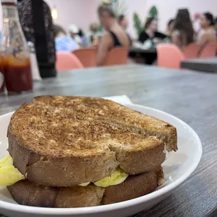 Ham and egg sandwich on wheat bread