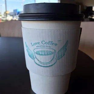 a cup of coffee on a table