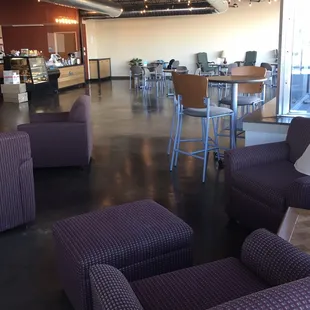 tables and chairs in a coffee shop