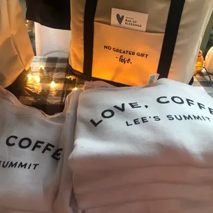 white t - shirts on a table