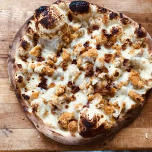 The Triple Threat- 3 words...   Chicken, Bacon, Ranch. Crispy chicken, crumbled bacon on top of a ranch base pairs well with...everything.
