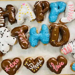 a variety of chocolate donuts