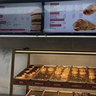 a display of doughnuts and pastries