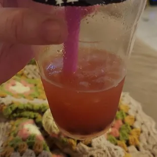 Strawberry fruit tea with green tea and boba. Real strawberry puree in it.