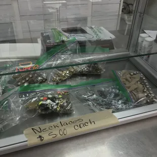 Check out the jewelry patrons can buy at the front.