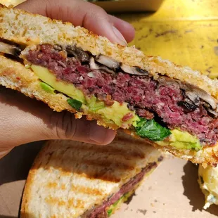 Awesome sandwich. Avocados, mushroom, sour dough bread and