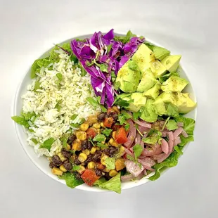 a plate of salad and rice