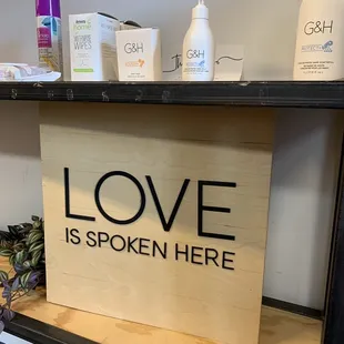 a shelf with shampoos and lotions