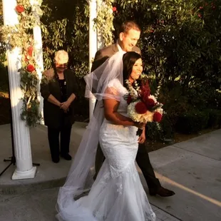 Mr. &amp; Mrs. Thompson - Love Jones beautifully crafted the gazebo garland and the bride's bouquet.
