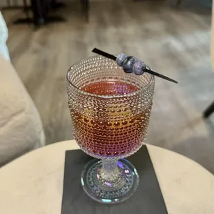 Blueberry lemon drop - vodka, limoncello, orange liqueur, blueberry simple, lemon juice, blueberry garnish