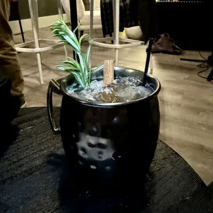 Gingerbread Mule - bourbon, gingerbread dream, lime juice, gingerbread simple, ginger beer, rosemary and cinnamon stick garnish