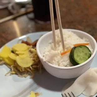 Steamed rice and other offerings of the buffet