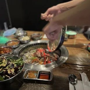 Staff cooking Beef