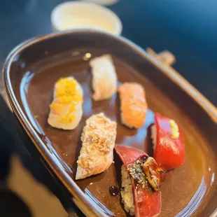 Part of the old school and new school omakase. Same fish prepared in two different ways.