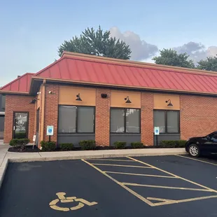 a car parked in front of a building