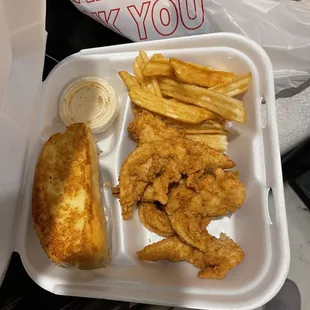 a tray of fried fish and fries