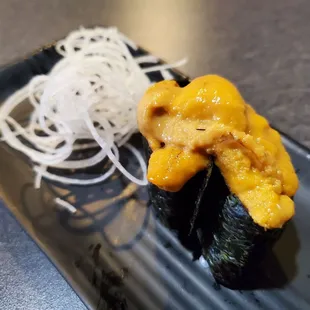 Uni nigiri. That&apos;s actually two pieces bunched up.