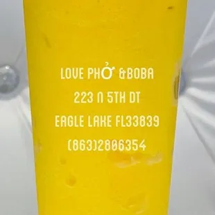 a plastic cup with a straw